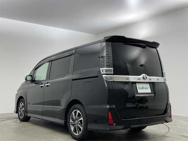 トヨタ ヴォクシー ZS 煌Ⅱ 岡山県 2020(令2)年 7.5万km ブラック 純正１０インチナビ/（Bluetooth/フルセグTV/USB/HDMI）/クルーズコントロール/衝突軽減ブレーキシステム/両側パワースライドドア/ビルトインＥＴＣ/LEDヘッドライト＆フォグ/オートハイビーム/オートライト/純正ドライブレコーダー（前後）/踏み間違い防止/横滑り防止装置/レーンアシスト/コーナーセンサー（前後）/アイドリングストップ/純正フロアマット/後席サンシェイド/シートバックテーブル/プッシュスタート/スマートキー×2