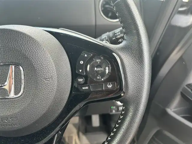 ホンダ Ｎ ＢＯＸ カスタム L ターボ 滋賀県 2021(令3)年 6.5万km シャイニンググレーM 純正ナビ/(フルセグ/SD/DVD/Bluetooth)/追従クルーズコントロール/両側電動/ＥＴＣ/ドライブレコーダー/シートヒーター/バックカメラ/ハーフレザーシート/ＬＥＤ/オートライト/オートハイビーム/クリアランスソナー/レーンキープアシスト/衝突軽減システム/横滑り防止装置/プッシュスタート/スマートキー×2