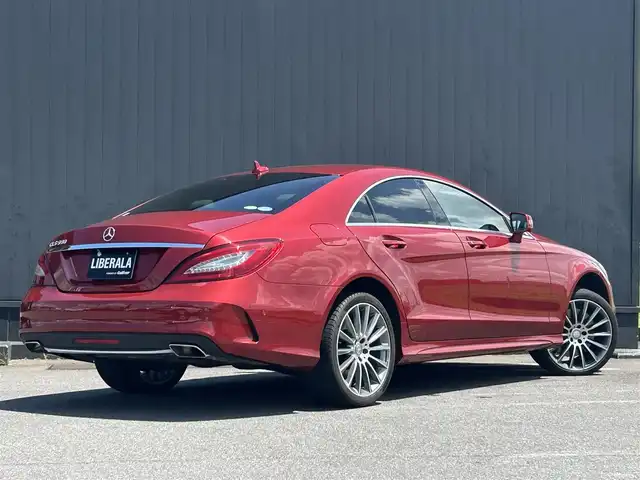 メルセデス・ベンツ ＣＬＳ５５０ 茨城県 2015(平27)年 4.7万km ヒヤシンスレッド ガラススライディングルーフ/レーダーセーフティパッケージ/-ブレーキアシストプラス/-PRE-SAFEブレーキ/-アクティブレーンキーピングアシスト/-アクティブブラインドスポットアシスト/-ディストロニック・プラス/AIRマティックサスペンション/AMGスタイリングパッケージ/-フロントスポイラー/リアスカート/19インチAMG5スポークアルミホイール/COMANDシステム/-7インチワイドディスプレイ/-HDDナビゲーション/-フルセグTV/Bluetooth/CD/DVD/パーキングアシストリアビューカメラ/クルーズコントロール＆可変スピードリミッター/パドルシフト/フロントシートヒーター/フロントパワーシート（メモリー付）/ETC