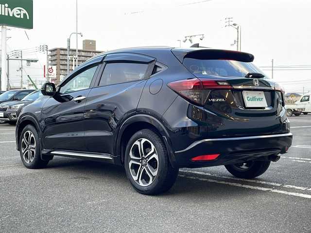 ホンダ ヴェゼル ハイブリッド Z ホンダセンシング 徳島県 2018(平30)年 7.7万km クリスタルブラックパール 社外SDナビ　VXM-185VFi/（DISC/ラジオ/フルセグ/BT/USB/iPod）/パドルシフト/オートブレーキホールド/ワイパーデザイアー/追従式クルーズコントロール/ETC/ハーフレザーシート/D・N席シートヒーター/LEDヘッドライト/純正17インチアルミホイール/純正フロアマット/ドライブレコーダー/ECON/ドアバイザー/フォグライト