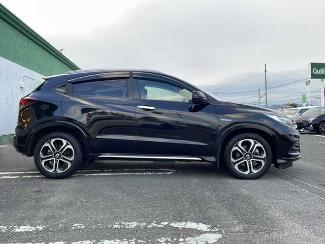 ホンダ ヴェゼル ハイブリッド Z ホンダセンシング 徳島県 2018(平30)年 7.7万km クリスタルブラックパール 社外SDナビ　VXM-185VFi/（DISC/ラジオ/フルセグ/BT/USB/iPod）/パドルシフト/オートブレーキホールド/ワイパーデザイアー/追従式クルーズコントロール/ETC/ハーフレザーシート/D・N席シートヒーター/LEDヘッドライト/純正17インチアルミホイール/純正フロアマット/ドライブレコーダー/ECON/ドアバイザー/フォグライト