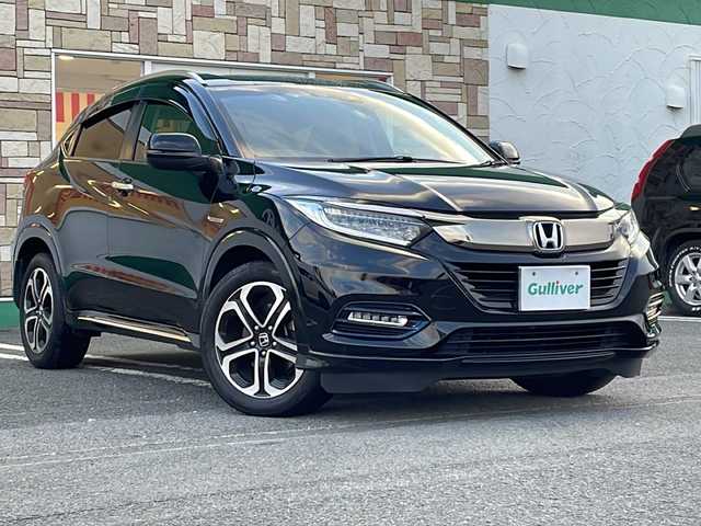 ホンダ ヴェゼル ハイブリッド Z ホンダセンシング 徳島県 2018(平30)年 7.7万km クリスタルブラックパール 社外SDナビ　VXM-185VFi/（DISC/ラジオ/フルセグ/BT/USB/iPod）/パドルシフト/オートブレーキホールド/ワイパーデザイアー/追従式クルーズコントロール/ETC/ハーフレザーシート/D・N席シートヒーター/LEDヘッドライト/純正17インチアルミホイール/純正フロアマット/ドライブレコーダー/ECON/ドアバイザー/フォグライト