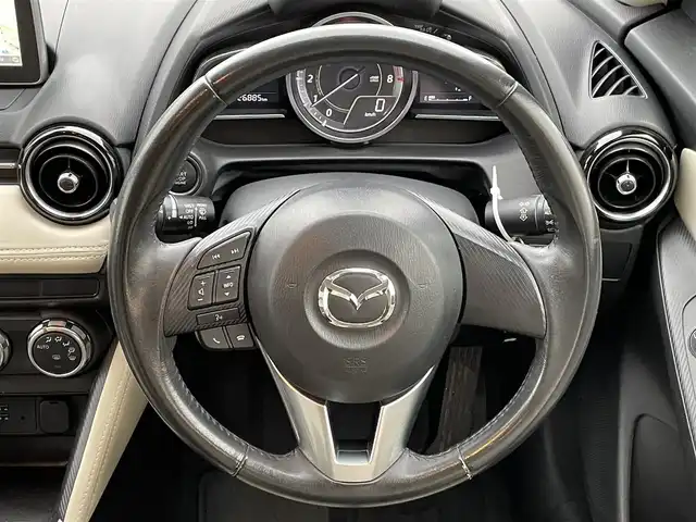 マツダ デミオ 13S Lパッケージ 東京都 2015(平27)年 2.7万km ディープクリスタルブルーマイカ マツダ純正ナビ/・BT/AM/FM/SD/バックビューモニター/ＵＳＢ入力端子/ドライブモード/純正フロアマット/純正ドアバイザー/アイドリングストップ/純正アルミ/コーナーセンサー/横滑り制御機能/プッシュスタート /スマートキー
