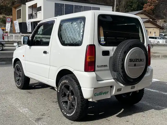 スズキ ジムニー XG 岐阜県 2010(平22)年 13.1万km スペリアホワイト 4WD/ディスプレイオーディオ/【Bluetooth．CD.DVD.AM/FM．AUX.iPod】/バックカメラ/ETC/リモコンキー/純正フロアマット/背面タイヤ/社外ドリンクホルダー/保証書/取扱説明書