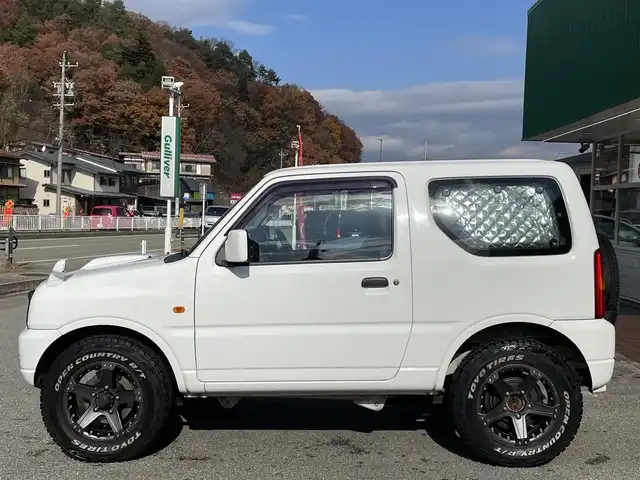 スズキ ジムニー XG 岐阜県 2010(平22)年 13.1万km スペリアホワイト 4WD/ディスプレイオーディオ/【Bluetooth．CD.DVD.AM/FM．AUX.iPod】/バックカメラ/ETC/リモコンキー/純正フロアマット/背面タイヤ/社外ドリンクホルダー/保証書/取扱説明書