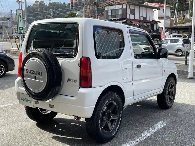 スズキ ジムニー XG 岐阜県 2010(平22)年 13.1万km スペリアホワイト 4WD/ディスプレイオーディオ/【Bluetooth．CD.DVD.AM/FM．AUX.iPod】/バックカメラ/ETC/リモコンキー/純正フロアマット/背面タイヤ/社外ドリンクホルダー/保証書/取扱説明書