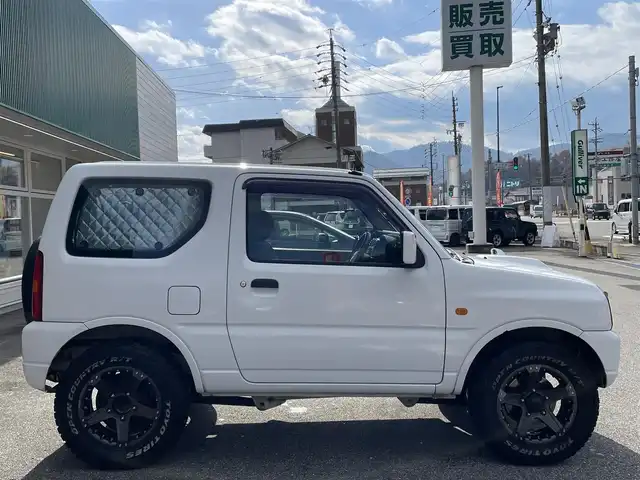 スズキ ジムニー XG 岐阜県 2010(平22)年 13.1万km スペリアホワイト 4WD/ディスプレイオーディオ/【Bluetooth．CD.DVD.AM/FM．AUX.iPod】/バックカメラ/ETC/リモコンキー/純正フロアマット/背面タイヤ/社外ドリンクホルダー/保証書/取扱説明書