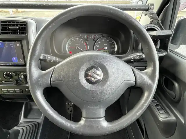 スズキ ジムニー XG 岐阜県 2010(平22)年 13.1万km スペリアホワイト 4WD/ディスプレイオーディオ/【Bluetooth．CD.DVD.AM/FM．AUX.iPod】/バックカメラ/ETC/リモコンキー/純正フロアマット/背面タイヤ/社外ドリンクホルダー/保証書/取扱説明書