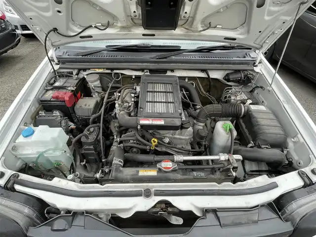 スズキ ジムニー XG 岐阜県 2010(平22)年 13.1万km スペリアホワイト 4WD/ディスプレイオーディオ/【Bluetooth．CD.DVD.AM/FM．AUX.iPod】/バックカメラ/ETC/リモコンキー/純正フロアマット/背面タイヤ/社外ドリンクホルダー/保証書/取扱説明書