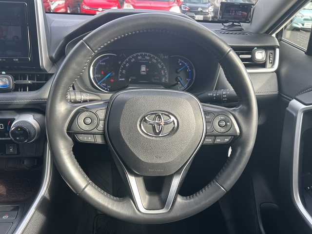 トヨタ ＲＡＶ４ ハイブリットG 東京都 2020(令2)年 5.7万km ホワイトパールクリスタルシャイン ワンオーナー/レザーシート/4WD/純正SDナビ（NSZT-Y68T）/・Bluetooth/TV/CD/DVD/SD/Toyota Safety Sense/・プリクラッシュセーフティ/・レーントレーシングアシスト/・レーダークルーズコントロール/・オートマチックハイビーム/・ロードサインアシスト/先行車発進告知機能/インテリジェントクリアランスソナー/リヤクロストラフィックオートブレーキ/ブラインドスポットモニター/横滑り防止装置/盗難防止装置/ドライブレコーダー/バックカメラ/オートライト/オートマチックハイビーム/オートエアコン/電動格納ミラー/プッシュスタート/電動リアゲート/コーナーセンサー/純正18インチアルミホイール/TRD製エアロパーツセット/TRD製オーバーフェンダー/ETC/スペアキー1本/取扱説明書