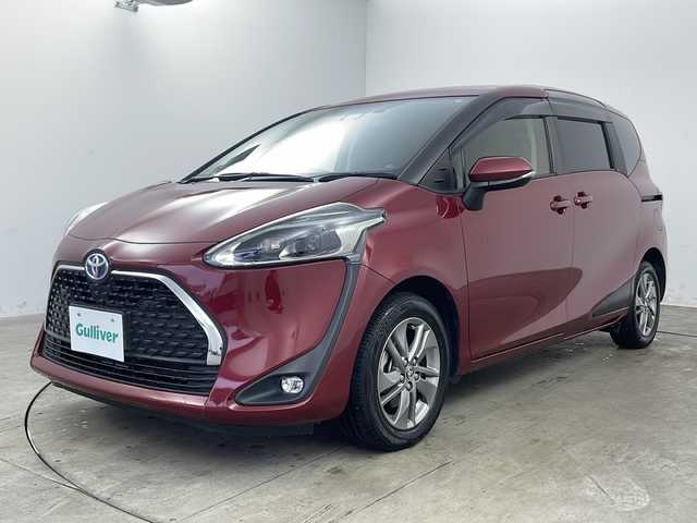 トヨタ シエンタ ハイブリッド ファンベースG クエロ 兵庫県 2020(令2)年 6.2万km センシュアルレッドマイカ ・純正ナビ/Bluetooth/CD/DVD/SD/TV/・バックカメラ/・トヨタセーフティセンス/・プリクラッシュセーフティ/・レーンディバーチャーアラート/・パーキングサポートブレーキ/・オートマチックハイビーム/・クルーズコントロール/・先行車発進告知機能/・ドライブスタートコントロール/・クリアランスソナー/・電子制御ブレーキシステム/・車両接近通報装置/・横滑り防止装置/・両側パワースライドドア/・ステアリングスイッチ/・ステアリングヒーター/・シート素材：合皮×スエード調/・前席シートヒーター/・純正フロアマット/・LEDヘッドライト/・フォグランプ/・純正15インチアルミホイール/・前後ドライブレコーダー/・ビルトインETC2.0/・AC100V充電/・スマートキー/・保証書