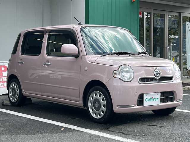 ダイハツ ミラ ココア X 京都府 2012(平24)年 5.1万km ムースピンクパール 禁煙車　/オーディオ　/オートエアコン　/アイドリングストップ　/ベンチシート　/ＣＤ　/スマートキー　/純正フロアマット　/パワーステアリング　/パワーウィンドウ　/ＡＢＳ　/ハロゲンライト　/電動格納ミラー　/ドアバイザー