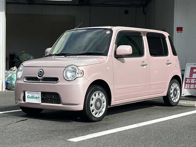 ダイハツ ミラ ココア X 京都府 2012(平24)年 5.1万km ムースピンクパール 禁煙車　/オーディオ　/オートエアコン　/アイドリングストップ　/ベンチシート　/ＣＤ　/スマートキー　/純正フロアマット　/パワーステアリング　/パワーウィンドウ　/ＡＢＳ　/ハロゲンライト　/電動格納ミラー　/ドアバイザー