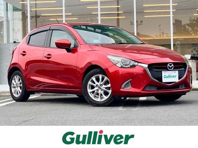 マツダ デミオ 13S Lパッケージ 静岡県 2014(平26)年 8.2万km ソウルレッドプレミアムメタリック エンジンスタートボタン/パワーステアリング/パワーウィンドウ/アイドリングストップ/スマートキー/スペアキー１本/オートエアコン/純正SDナビ（BT）/バックカメラ/ドライブレコーダー/純正フロアマット/純正アルミホイール/ハーフレザー/ABS/横滑り防止装置/オートライト/LEDヘッドライト/W+サイドエアバック/衝突軽減システム/純正アームレスト