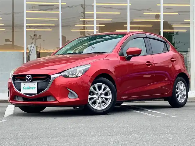 マツダ デミオ 13S Lパッケージ 静岡県 2014(平26)年 8.2万km ソウルレッドプレミアムメタリック エンジンスタートボタン/パワーステアリング/パワーウィンドウ/アイドリングストップ/スマートキー/スペアキー１本/オートエアコン/純正SDナビ（BT）/バックカメラ/ドライブレコーダー/純正フロアマット/純正アルミホイール/ハーフレザー/ABS/横滑り防止装置/オートライト/LEDヘッドライト/W+サイドエアバック/衝突軽減システム/純正アームレスト