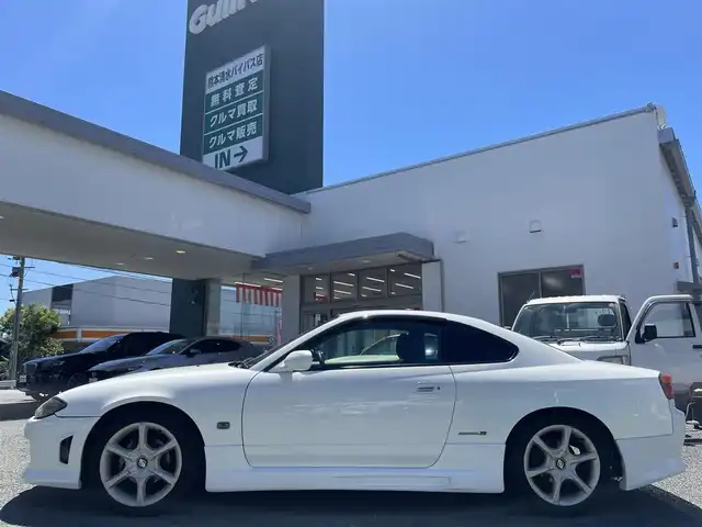 日産 シルビア スペックR bパッケージ 熊本県 2000(平12)年 17.8万km ホワイトパール エアロ/社外オーディオ/【ＡＭ／ＦＭ／ＣＤ／ＵＳＢ／ＡＵＸ】/HKS車高調/HKSサイレントハイパワーマフラー/純正17インチアルミホイール/HIDヘッドライト/ヘッドライトレベライザー/電格ミラー/純正フロアマット