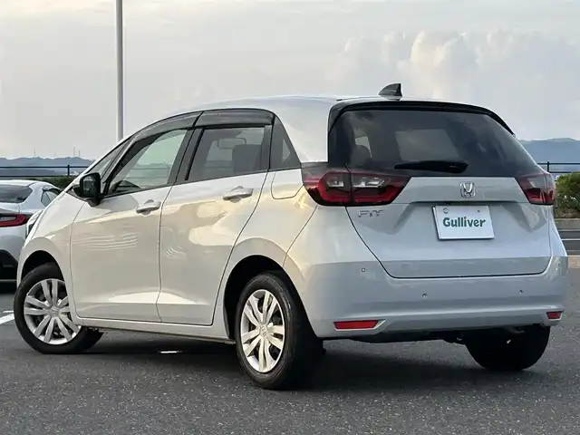 ホンダ フィット ホーム 島根県 2022(令4)年 2.3万km プレミアムサンライトホワイトパール 登録時走行距離22199km/取扱説明書【車両/ナビ】/保証書/純正Gathersナビ/バックカメラ/衝突軽減ブレーキ/レーダークルーズコントロール/レーンキープアシスト/プッシュスタート/スマートキー(スペアスマート×1)/ハーフレザーシート/LEDヘッドライト/オートライト/ドライブレコーダー/ETC