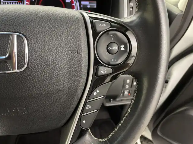 ホンダ オデッセイ アブソルート ホンダセンシング 鹿児島県 2019(平31)年 5.6万km プラチナホワイトパール 純正ナビ/(BT/CD/DVD/AM/FM/フルセグTV)/ホンダセンシング/アラウンドビューモニター/パーキングアシスト/レーダークルーズコントロール/ALPINE製フリップダウンモニター/オットマンシート/ハーフレザーシート/アイドリングストップ/前後ドライブレコーダー/ETC2.0/両側パワースライドドア/運転席パワーシート/パドルシフト/HDMI/純正17インチアルミホイール/純正フロアマット/保証書/取扱説明書