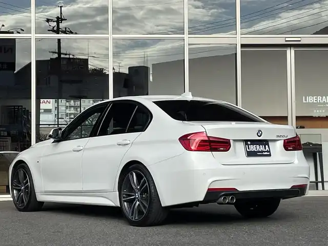 ＢＭＷ ３２０ｄ Mスポーツ 福岡県 2017(平29)年 6.6万km 白 ＡＣＣ／ＢＳＭ　/アンビエントライト　/純正ナビ　/Ｂカメラ　/Ｂｌｕｅｔｏｏｔｈ　/ＣＤ／ＤＶＤ　/パドルシフト　/後ソナー　/コンフォートアクセス　/純正ＯＰ１９インチＡＷ（ダブルスポーク・スタイリング７９１Ｍ）