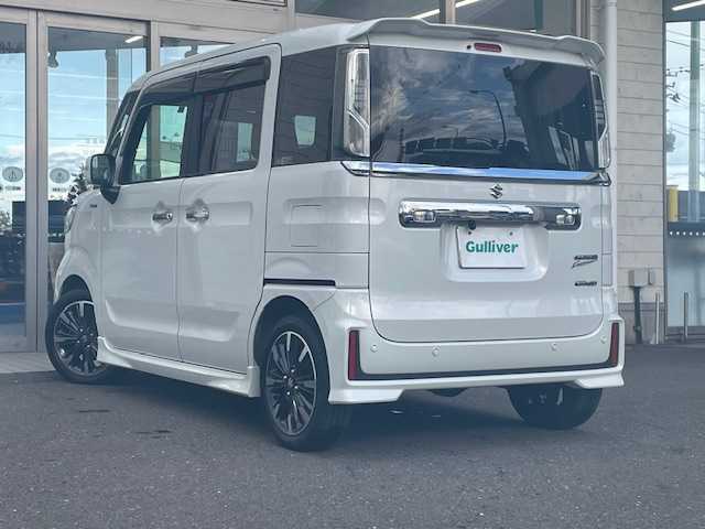 スズキ スペーシア カスタム HYBRID XS 青森県 2022(令4)年 1.5万km ピュアホワイトP ４ＷＤ/HV/社外ナビ（フルセグ/AM/FM）/両側パワースライドドア/リアサーキュレーター/D/N席シートヒーター/パーキングセンサー/コーナーセンサー/衝突軽減システム/横滑り防止装置/アイドリングストップ/165/55/15純正アルミホイール夏タイヤ/社外エンジンスターター/スペアキー/ＥＴＣ/保証書/取扱説明書