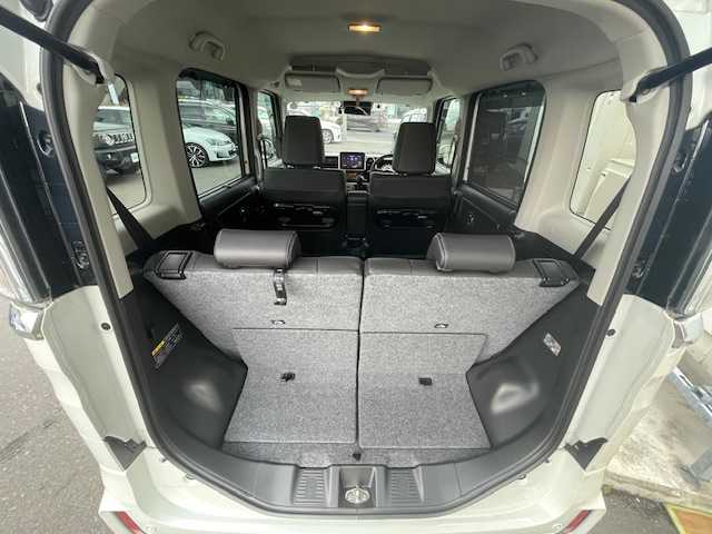 スズキ スペーシア カスタム HYBRID XS 青森県 2022(令4)年 1.5万km ピュアホワイトP ４ＷＤ/HV/社外ナビ（フルセグ/AM/FM）/両側パワースライドドア/リアサーキュレーター/D/N席シートヒーター/パーキングセンサー/コーナーセンサー/衝突軽減システム/横滑り防止装置/アイドリングストップ/165/55/15純正アルミホイール夏タイヤ/社外エンジンスターター/スペアキー/ＥＴＣ/保証書/取扱説明書