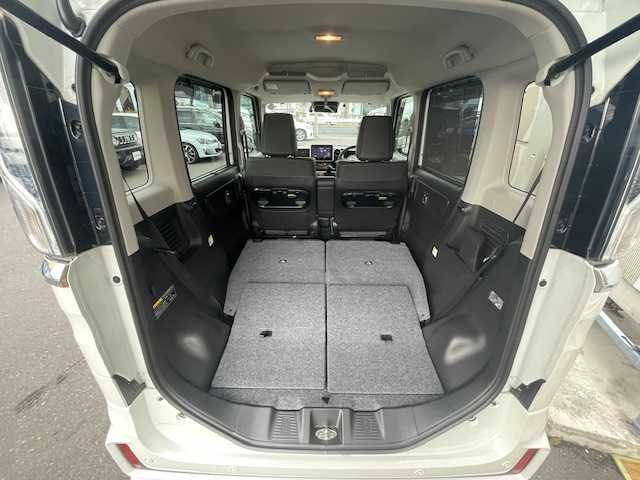 スズキ スペーシア カスタム HYBRID XS 青森県 2022(令4)年 1.5万km ピュアホワイトP ４ＷＤ/HV/社外ナビ（フルセグ/AM/FM）/両側パワースライドドア/リアサーキュレーター/D/N席シートヒーター/パーキングセンサー/コーナーセンサー/衝突軽減システム/横滑り防止装置/アイドリングストップ/165/55/15純正アルミホイール夏タイヤ/社外エンジンスターター/スペアキー/ＥＴＣ/保証書/取扱説明書