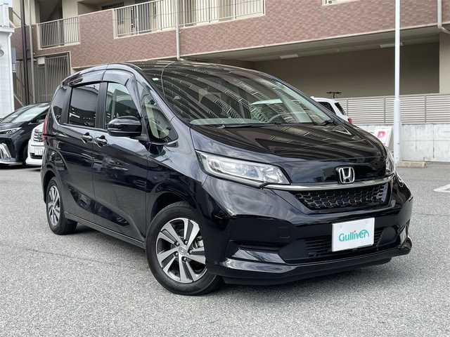 ホンダ フリード G ホンダセンシング 大阪府 2020(令2)年 1.5万km クリスタルブラックパール ７インチ純正ナビ　VXM-204VFi/・フルセグTV/CD/DVD/Bluetooth/Honda　SENSING/・衝突軽減ブレーキ/・誤発進抑制機能/・歩行者事故低減ステアリング/・先行者発進お知らせ機能/・標識認識機能/・路外逸脱抑制機能/・アダプティブクルーズコントロール/・車線維持支援システム後方誤発進抑制機能/両側パワースライドドア/バックカメラ/前後純正ドライブレコーダー（ナビ連動タイプ）DRH-204VD/オートライト/ステアリングスイッチ/ビルドインETC/ドアバイザー/ハーフレザーシート/シートヒーター/スペアキー/取扱説明書/保証書/記録簿　R2/R3/R4/R6