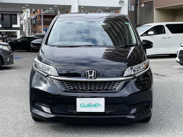 ホンダ フリード G ホンダセンシング 大阪府 2020(令2)年 1.5万km クリスタルブラックパール ７インチ純正ナビ　VXM-204VFi/・フルセグTV/CD/DVD/Bluetooth/Honda　SENSING/・衝突軽減ブレーキ/・誤発進抑制機能/・歩行者事故低減ステアリング/・先行者発進お知らせ機能/・標識認識機能/・路外逸脱抑制機能/・アダプティブクルーズコントロール/・車線維持支援システム後方誤発進抑制機能/両側パワースライドドア/バックカメラ/前後純正ドライブレコーダー（ナビ連動タイプ）DRH-204VD/オートライト/ステアリングスイッチ/ビルドインETC/ドアバイザー/ハーフレザーシート/シートヒーター/スペアキー/取扱説明書/保証書/記録簿　R2/R3/R4/R6