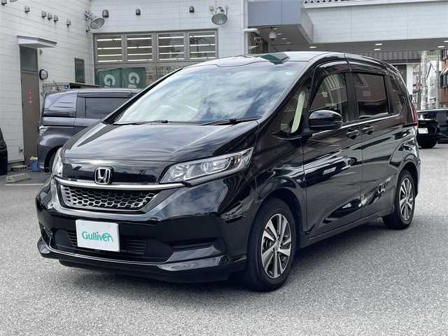 ホンダ フリード G ホンダセンシング 大阪府 2020(令2)年 1.5万km クリスタルブラックパール ７インチ純正ナビ　VXM-204VFi/・フルセグTV/CD/DVD/Bluetooth/Honda　SENSING/・衝突軽減ブレーキ/・誤発進抑制機能/・歩行者事故低減ステアリング/・先行者発進お知らせ機能/・標識認識機能/・路外逸脱抑制機能/・アダプティブクルーズコントロール/・車線維持支援システム後方誤発進抑制機能/両側パワースライドドア/バックカメラ/前後純正ドライブレコーダー（ナビ連動タイプ）DRH-204VD/オートライト/ステアリングスイッチ/ビルドインETC/ドアバイザー/ハーフレザーシート/シートヒーター/スペアキー/取扱説明書/保証書/記録簿　R2/R3/R4/R6