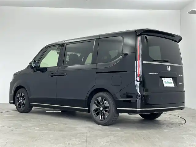 ホンダ ステップワゴン スパーダ eHEV 愛知県 2025(令7)年 0.1万km未満 クリスタルブラックパール 登録済み未使用車/ホンダセンシング/純正11.4インチHONDA　CONNECTナビ/（Bluetooth/CD/DVD/AppleCarPlay/フルセグTV）/バックカメラ/ハーフレザー/シートヒーター/電動リアゲード/両側パワースライドドア/格納シート/純正LEDライト/コーナリングライト/オットマン/純正16インチAW/パドルシフト