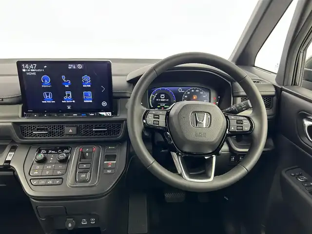 ホンダ ステップワゴン スパーダ eHEV 愛知県 2025(令7)年 0.1万km未満 クリスタルブラックパール 登録済み未使用車/ホンダセンシング/純正11.4インチHONDA　CONNECTナビ/（Bluetooth/CD/DVD/AppleCarPlay/フルセグTV）/バックカメラ/ハーフレザー/シートヒーター/電動リアゲード/両側パワースライドドア/格納シート/純正LEDライト/コーナリングライト/オットマン/純正16インチAW/パドルシフト