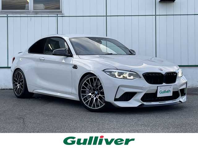 ＢＭＷ Ｍ２ コンペティション 山梨県 2019(令1)年 2.6万km アルピンホワイトⅢ 純正HDDナビ/Bluetooth接続/バックカメラ/前席パワーシート/前席シートヒーター/インテリジェントセーフティー/HarmanKardonスピーカー/前後ドライブレコーダー/カーボンパーツ多数/アイドリングストップ/コーナーセンサー/取扱説明書/保証書