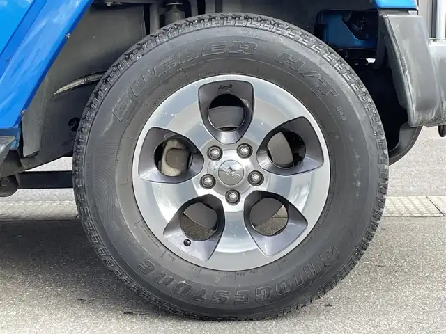 クライスラー・ジープ ジープ ラングラー 青森県 2016(平28)年 3.5万km 青 社外ナビ/(フルセグTV/CD/DVD/Bluetooth)/ALPINEスピーカー/バックカメラ/ETC/前後ドライブレコーダー/前席シートヒーター/クルーズコントロール/純正フロアマット/純正アルミホイール/横滑り防止装置/ダウンヒルアシスト/4WD/寒冷地仕様車/オートライト/LEDヘッドライト/レザーシート