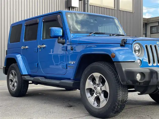 クライスラー・ジープ ジープ ラングラー 青森県 2016(平28)年 3.5万km 青 社外ナビ/(フルセグTV/CD/DVD/Bluetooth)/ALPINEスピーカー/バックカメラ/ETC/前後ドライブレコーダー/前席シートヒーター/クルーズコントロール/純正フロアマット/純正アルミホイール/横滑り防止装置/ダウンヒルアシスト/4WD/寒冷地仕様車/オートライト/LEDヘッドライト/レザーシート