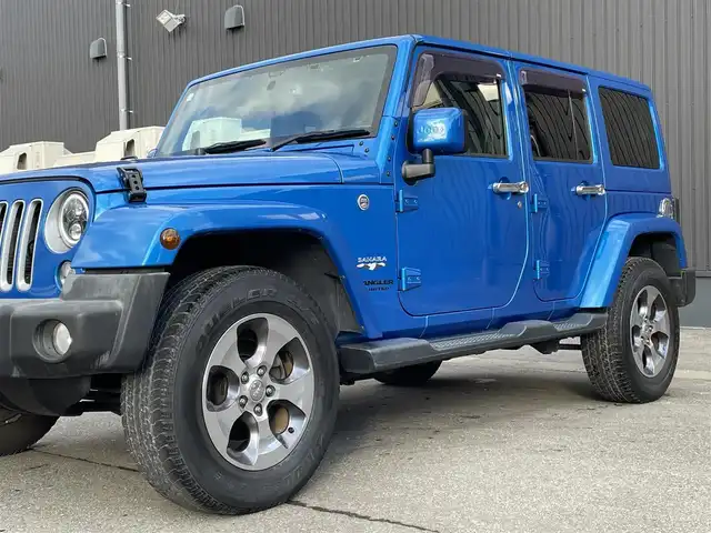 クライスラー・ジープ ジープ ラングラー 青森県 2016(平28)年 3.5万km 青 社外ナビ/(フルセグTV/CD/DVD/Bluetooth)/ALPINEスピーカー/バックカメラ/ETC/前後ドライブレコーダー/前席シートヒーター/クルーズコントロール/純正フロアマット/純正アルミホイール/横滑り防止装置/ダウンヒルアシスト/4WD/寒冷地仕様車/オートライト/LEDヘッドライト/レザーシート