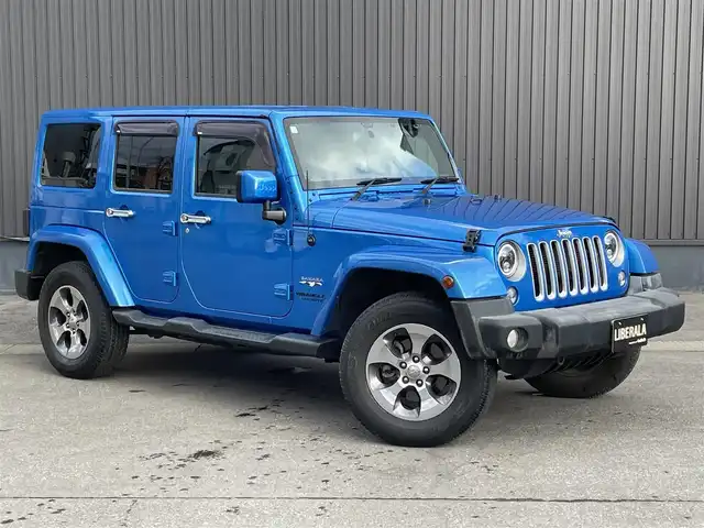 クライスラー・ジープ ジープ ラングラー 青森県 2016(平28)年 3.5万km 青 社外ナビ/(フルセグTV/CD/DVD/Bluetooth)/ALPINEスピーカー/バックカメラ/ETC/前後ドライブレコーダー/前席シートヒーター/クルーズコントロール/純正フロアマット/純正アルミホイール/横滑り防止装置/ダウンヒルアシスト/4WD/寒冷地仕様車/オートライト/LEDヘッドライト/レザーシート