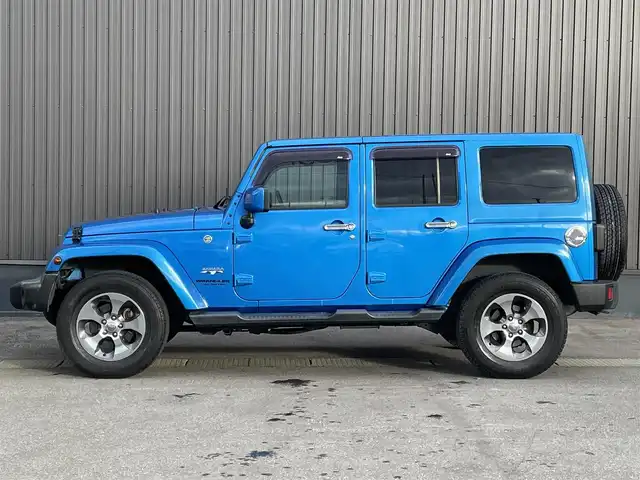 クライスラー・ジープ ジープ ラングラー 青森県 2016(平28)年 3.5万km 青 社外ナビ/(フルセグTV/CD/DVD/Bluetooth)/ALPINEスピーカー/バックカメラ/ETC/前後ドライブレコーダー/前席シートヒーター/クルーズコントロール/純正フロアマット/純正アルミホイール/横滑り防止装置/ダウンヒルアシスト/4WD/寒冷地仕様車/オートライト/LEDヘッドライト/レザーシート