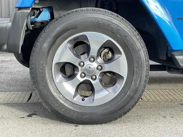 クライスラー・ジープ ジープ ラングラー 青森県 2016(平28)年 3.5万km 青 社外ナビ/(フルセグTV/CD/DVD/Bluetooth)/ALPINEスピーカー/バックカメラ/ETC/前後ドライブレコーダー/前席シートヒーター/クルーズコントロール/純正フロアマット/純正アルミホイール/横滑り防止装置/ダウンヒルアシスト/4WD/寒冷地仕様車/オートライト/LEDヘッドライト/レザーシート