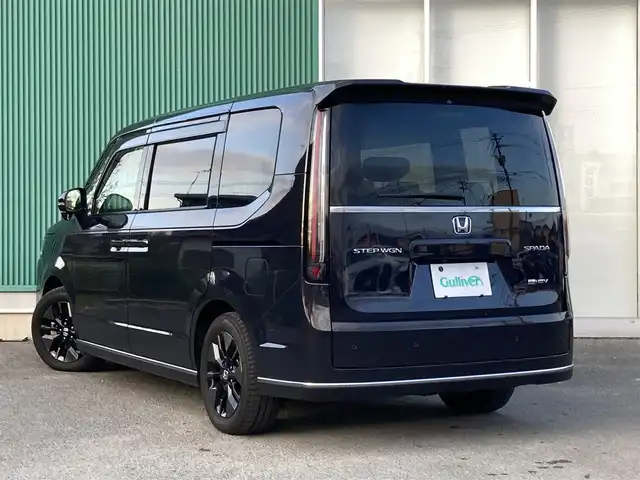 ホンダ ステップワゴン スパーダ eHEV 福岡県 2022(令4)年 4.5万km トワイライトミストブラックパール ワンオーナー/無限グリル/純正11.4インチナビ/（AM/FM/DISC/SD/SDREC/BT/フルセグ）/AppleCarPlay/AndroidAuto/Bカメラ/レーダークルーズコントロール/両側パワースライドドア/電動リアゲート/LEDヘッドライト/オートライト/ハーフレザーシート/オットマン/DN席シートヒーター/純正16インチAW/ステアリングスイッチ/ハンドルアシスト/サンシェード/BSM/横滑り防止装置/コーナーセンサー/レーンキープアシスト/盗難防止装置/衝突被害軽減システム/アイドリングストップ/ドライブレコーダー/スマートキー/ETC/保証書/取扱説明書