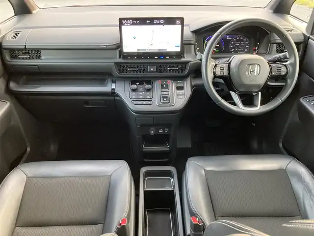 ホンダ ステップワゴン スパーダ eHEV 福岡県 2022(令4)年 4.5万km トワイライトミストブラックパール ワンオーナー/無限グリル/純正11.4インチナビ/（AM/FM/DISC/SD/SDREC/BT/フルセグ）/AppleCarPlay/AndroidAuto/Bカメラ/レーダークルーズコントロール/両側パワースライドドア/電動リアゲート/LEDヘッドライト/オートライト/ハーフレザーシート/オットマン/DN席シートヒーター/純正16インチAW/ステアリングスイッチ/ハンドルアシスト/サンシェード/BSM/横滑り防止装置/コーナーセンサー/レーンキープアシスト/盗難防止装置/衝突被害軽減システム/アイドリングストップ/ドライブレコーダー/スマートキー/ETC/保証書/取扱説明書