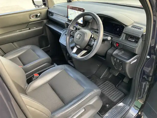 ホンダ ステップワゴン スパーダ eHEV 福岡県 2022(令4)年 4.5万km トワイライトミストブラックパール ワンオーナー/無限グリル/純正11.4インチナビ/（AM/FM/DISC/SD/SDREC/BT/フルセグ）/AppleCarPlay/AndroidAuto/Bカメラ/レーダークルーズコントロール/両側パワースライドドア/電動リアゲート/LEDヘッドライト/オートライト/ハーフレザーシート/オットマン/DN席シートヒーター/純正16インチAW/ステアリングスイッチ/ハンドルアシスト/サンシェード/BSM/横滑り防止装置/コーナーセンサー/レーンキープアシスト/盗難防止装置/衝突被害軽減システム/アイドリングストップ/ドライブレコーダー/スマートキー/ETC/保証書/取扱説明書