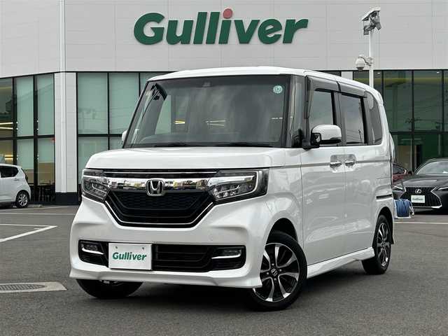 ホンダ Ｎ ＢＯＸ カスタム G L ホンダセンシング 愛媛県 2019(平31)年 5.8万km プラチナホワイトパール 登録時走行距離：57429Km/ディーラーOP純正メモリナビ/フルセグTV/Bluetooth/CD/DVD/AM/FM/ビルトインETC/後コーナーセンサー/スマートキー/スペアキー/ベンチシート/両側パワスラ/横滑り防止装置/衝突軽減システム/レーンキープアシスト/LEDヘッドライト/オートライト/フォグランプ/エンジンスタートボタン/スマートキー/スペアキー/純正アルミホイール/純正フロアマット/サンシェード
