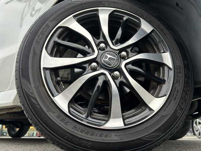 ホンダ Ｎ ＢＯＸ カスタム G L ホンダセンシング 愛媛県 2019(平31)年 5.8万km プラチナホワイトパール 登録時走行距離：57429Km/ディーラーOP純正メモリナビ/フルセグTV/Bluetooth/CD/DVD/AM/FM/ビルトインETC/後コーナーセンサー/スマートキー/スペアキー/ベンチシート/両側パワスラ/横滑り防止装置/衝突軽減システム/レーンキープアシスト/LEDヘッドライト/オートライト/フォグランプ/エンジンスタートボタン/スマートキー/スペアキー/純正アルミホイール/純正フロアマット/サンシェード