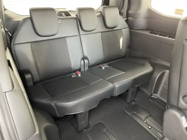 ホンダ ステップワゴン スパーダ eHEV 愛知県 2025(令7)年 0.1万km未満 黒 登録済み未使用車/ホンダセンシング/　・衝突軽減ブレーキ/　・誤発進抑制機能/　・後方誤発進抑制機能/　・近距離衝突軽減ブレーキ/　・歩行者事故低減ステアリング/　・路外越脱抑制機能/　・アダプティブクルーズコントロール/　・車線維持支援システム/　・トラフィックジャムアシスト/　・先行発進知らせ機能/　・標識認識機能/　・オートハイビーム/ホンダパーソナルアシスト/純正11.4インチHONDA　CONNECTナビ/　（Bluetooth/CD/Apple CarPlay/）/バックカメラ/ディライト/ハーフレザー/シートヒーター/本革ステアリング/シートバックテーブル/両側パワースライドドア/電動リアゲード/3列目格納シート/純正LEDライト/コーナリングライト/パドルシフト/オットマン
