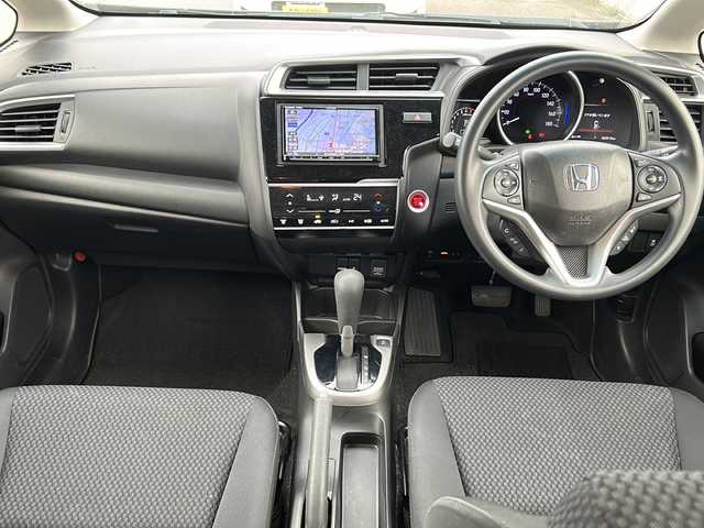 ホンダ フィット 13G F 富山県 2017(平29)年 6.5万km ルージュアメジストM 禁煙車　/純正ＨＤＤナビ　/フルセグ　/バックカメラ　/レーダークルーズコントロール　/スマートキー　/純正アルミホイール　/純正オーディオ　/ウィンカーミラー　/電動格納ミラー　/ビルトインＥＴＣ　/プッシュスタート