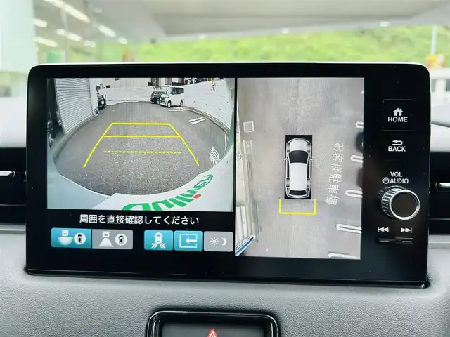 ホンダ ヴェゼル ハイブリッド e:HEV Z 神奈川県 2023(令5)年 1.4万km プレミアムサンライトホワイトパール ワンオーナー/純正メモリナビ/・DTV/Bluetooth/バックカメラ/全方位モニタ/前後ドライブレコーダー/ハーフレザーシート/前席シートヒーター/ステアリングヒーター/デジタルインナーミラー/Honda SENSING/・衝突軽減ブレーキ/・踏み間違い衝突軽減システム/・路外逸脱抑制機能/・先行車発進告知機能/・オートハイビーム/・ブラインドスポットインフォメーション/・アダプティブクルーズコントロール/・車線維持支援システム/・パーキングセンサーシステム/横滑り防止機能/盗難防止機能/純正18インチアルミホイール/純正LEDヘッドライト/フォグランプ/純正フロアマット/革巻きステアリング/ビルトインETC2.0/プッシュエンジンスタート/スマートキー×1/取扱説明書/新車時保証書
