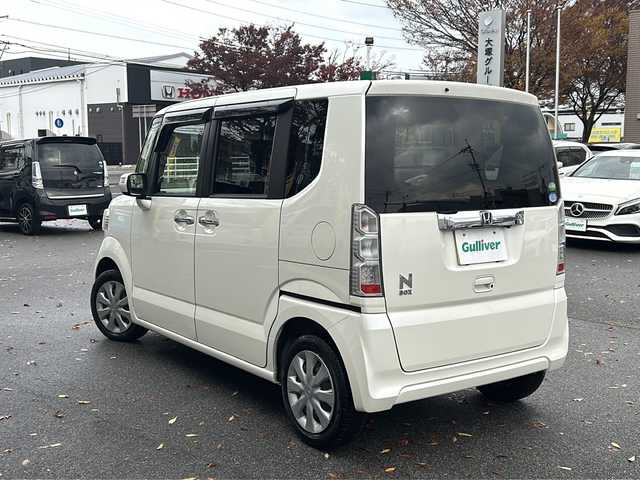 ホンダ Ｎ ＢＯＸ G Lパッケージ 鳥取県 2015(平27)年 6.7万km プレミアムホワイトパールⅡ ナビ装着用スペシャルパッケージ/リア左側パワースライドドア＆両側イージークローザー（リア両側）/スーパーＵＶカットフロントドアガラス＋ＩＲカットフロントウィンドウ・フロントドアガラス/リア席サンシェード/ワンタッチウィンカー/ワンセグテレビ/AM/FM、CD/DVD/ドアバイザー/プッシュスタート/片側パワースライドドア/ETC