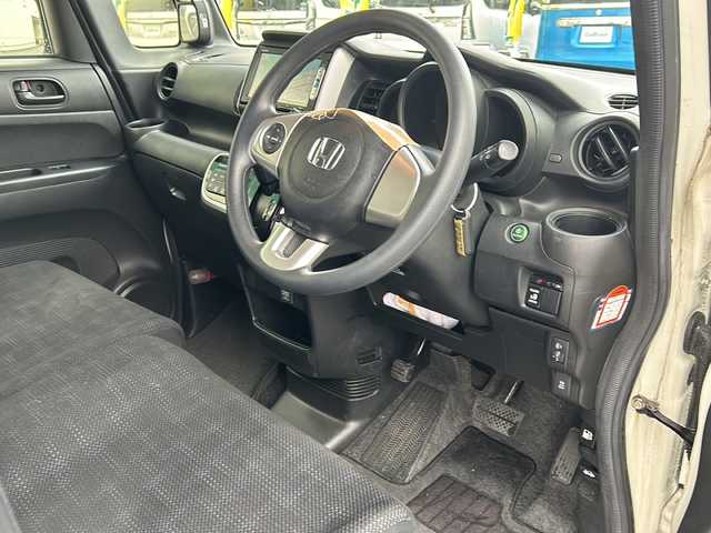 ホンダ Ｎ ＢＯＸ G Lパッケージ 鳥取県 2015(平27)年 6.7万km プレミアムホワイトパールⅡ ナビ装着用スペシャルパッケージ/リア左側パワースライドドア＆両側イージークローザー（リア両側）/スーパーＵＶカットフロントドアガラス＋ＩＲカットフロントウィンドウ・フロントドアガラス/リア席サンシェード/ワンタッチウィンカー/ワンセグテレビ/AM/FM、CD/DVD/ドアバイザー/プッシュスタート/片側パワースライドドア/ETC