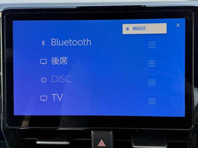 トヨタ ヴォクシー ハイブリッド S－Z 愛知県 2024(令6)年 1.6万km アティチュードブラックマイカ /ワンオーナー車//D記録簿R6-R7//10.5インチディスプレイオーディオ//AM/FM/TV（フルセグ）＋CD・DVDデッキ//BT/USB/Miracast//快適利便パッケージ//ハンズフリーデュアルパワースライドドア//パワーバックドア//1列目2列目シートヒーター//2列目オットマン//2列目角度調整付きアームレスト//ドライビングサポートパッケージ//カラーヘッドアップディスプレイ//デジタルインナーミラー//純正13.2インチ有機EL後席モニター//ETC2.0//レーダークルーズコントロール//ブラインドスポットモニター//レーンディパーチャーアラート//プリクラッシュセーフティー//プロアクティブドライビングシステム//クリアランスソナー//リヤクロストラフィックアラート//リヤカメラディテクション//パーキングサポートブレーキ//安心降車アシスト//ロードサインアシスト//レーンチェンジアシスト//フロントクロストラフィックアラート//アドバンストパーク//パノラミックビューモニター//バックカメラ//オートLEDヘッドライト//オートハイビーム//オートブレーキホールド//電動パーキングブレーキ//ステアリングスイッチ//ステアリングヒーター//AC100V//保証書//取説