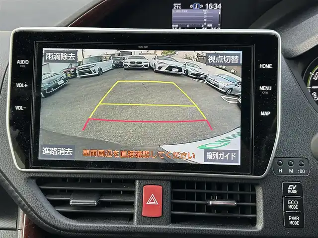 トヨタ ノア ハイブリッド G 福岡県 2020(令2)年 4.8万km アバンギャルドブロンズメタリック ワンオーナー/純正ディーラーナビ（TV/BT/DVD/AM/FM)/3列シート/パワースライドドア/クルーズコントロール/バックカメラ/コーナーセンサー（前後）/ウォークスルー/ドライブレコーダー(前後)/ビルトインETC/モード（EV/ECO/PWR）/オートエアコン（前席・後席）/TVキャンセラー/オートライト/オートハイビーム/フォグランプ/LEDヘッドライト/純正アルミホイール/純正フロアマット/シートヒーター/プッシュスタートボタン/スマートキー/盗難防止装置/横滑り防止装置/レーンキープアシスト/取扱説明書/保証書/スマートキー×１